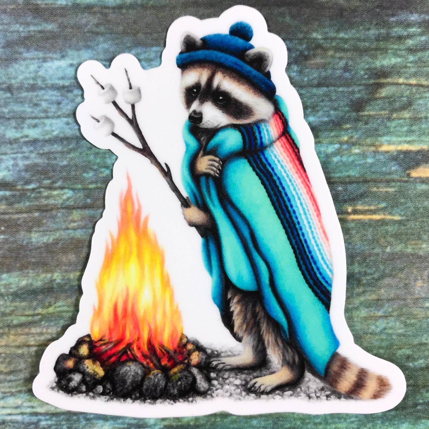 Raccoon roasting marshmallows sticker - The Regal Find