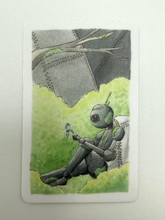 Illustration of a robot sitting on grass with a tree in the background