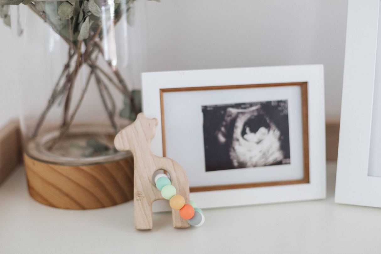 Giraffe Grasping Wooden Baby Toy with Teething Beads: CONFETTI - The Regal Find