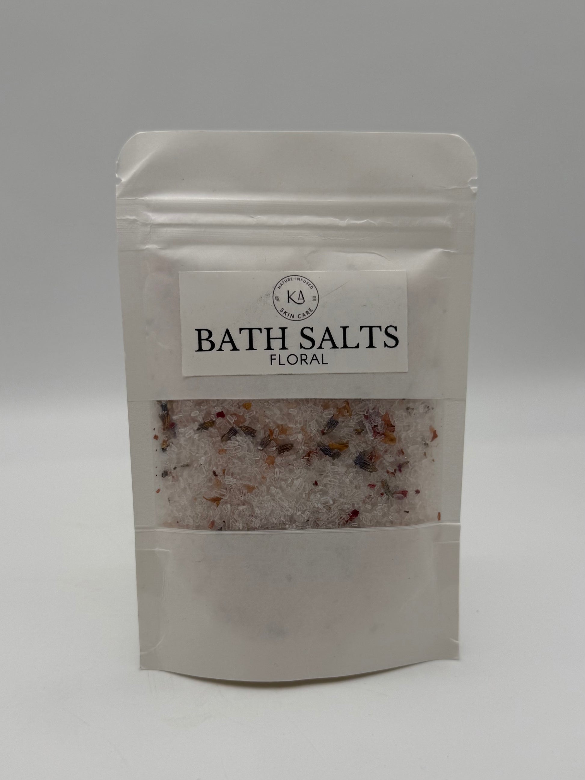 Packaged bath salts with a visible brand label on a white background